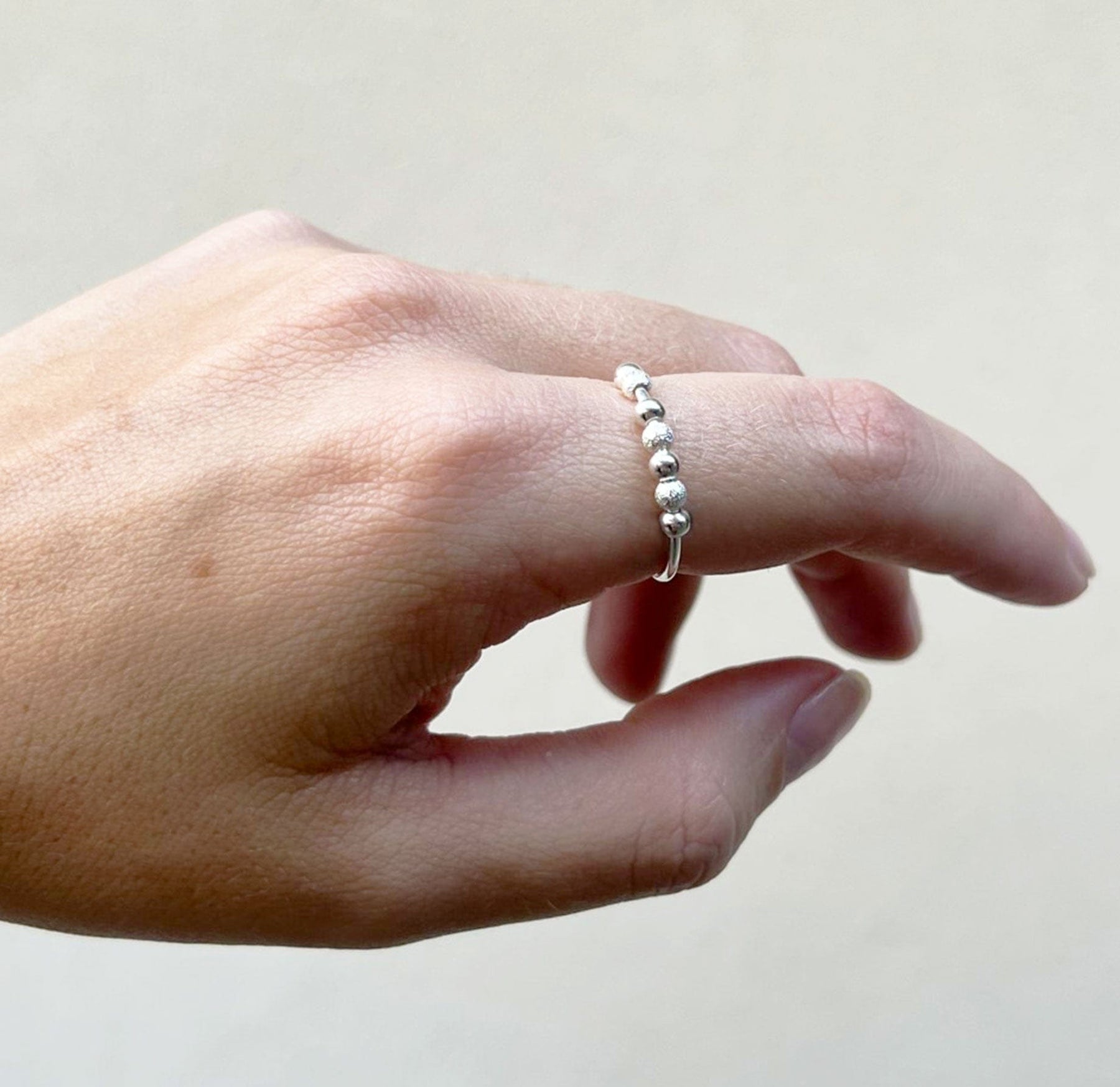 Anel Bead Rotativo em Prata 925